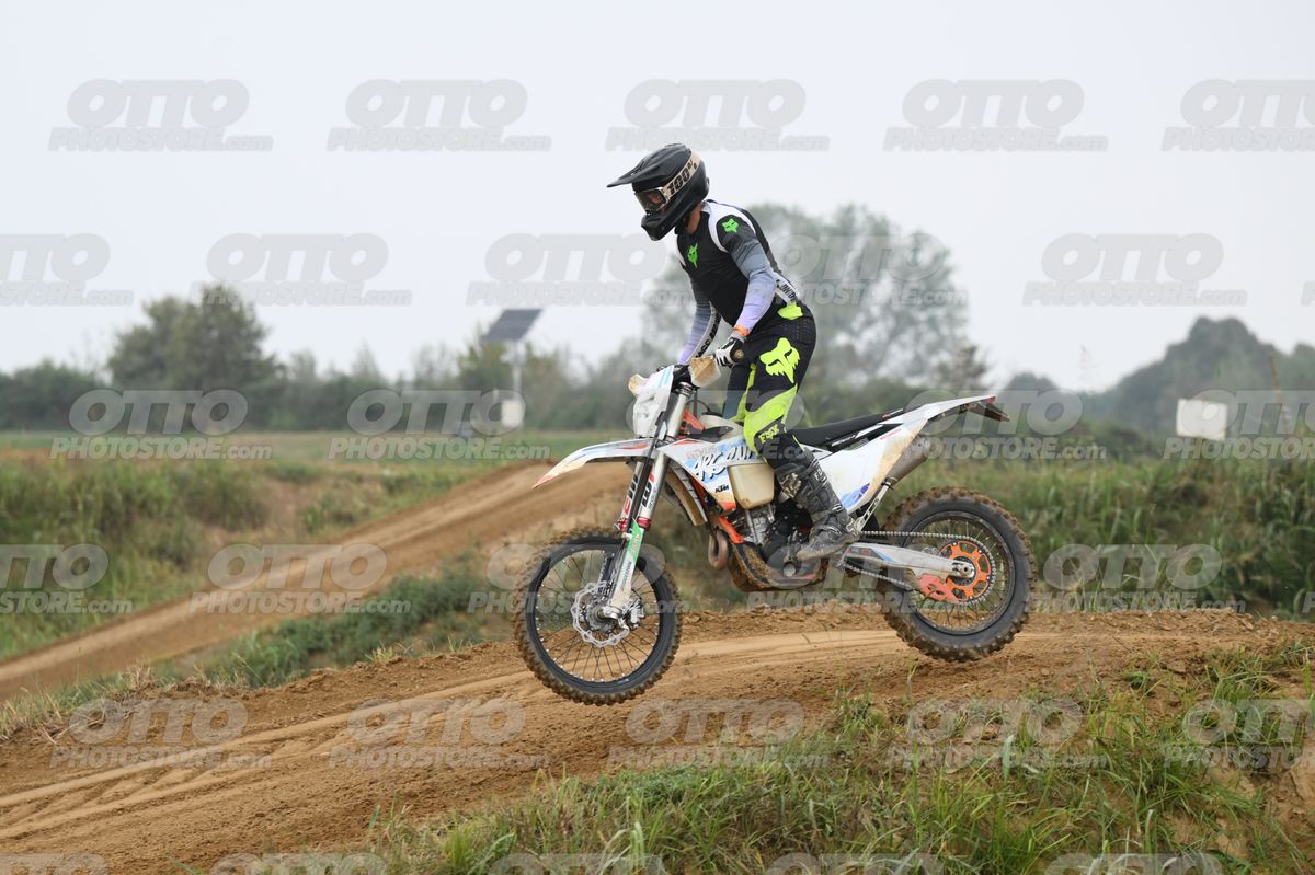 WHITE BIKE WITH PINK NUMBER PLATE - BLACK GREY FLUO GREEN FOX SUIT WITH FLUO YELLOW GREEN TEAL PANTS - BLACK GREY HELMET · DSH_0210