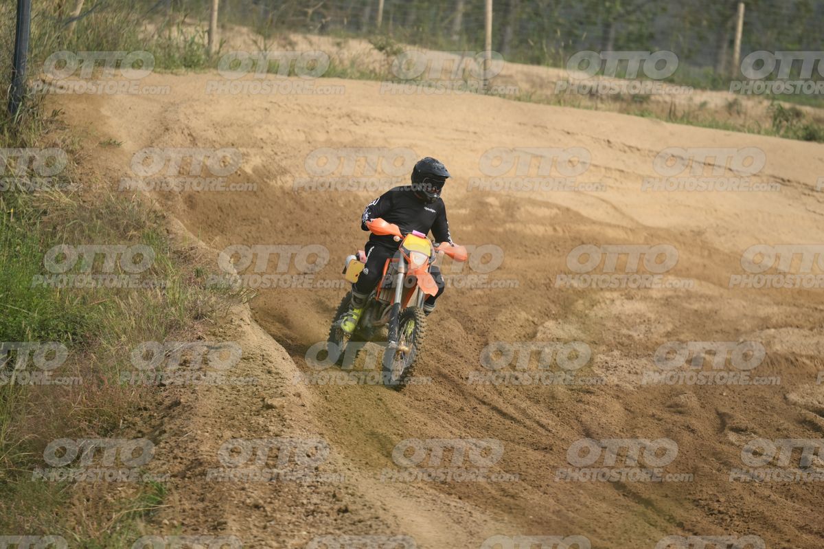 KTM EXC ORANGE - BLACK SUIT WITH WHITE GRAPHICS - BLACK HELMET WITH GOGGLES - FLUO YELLOW BOOTS · DSH_0226