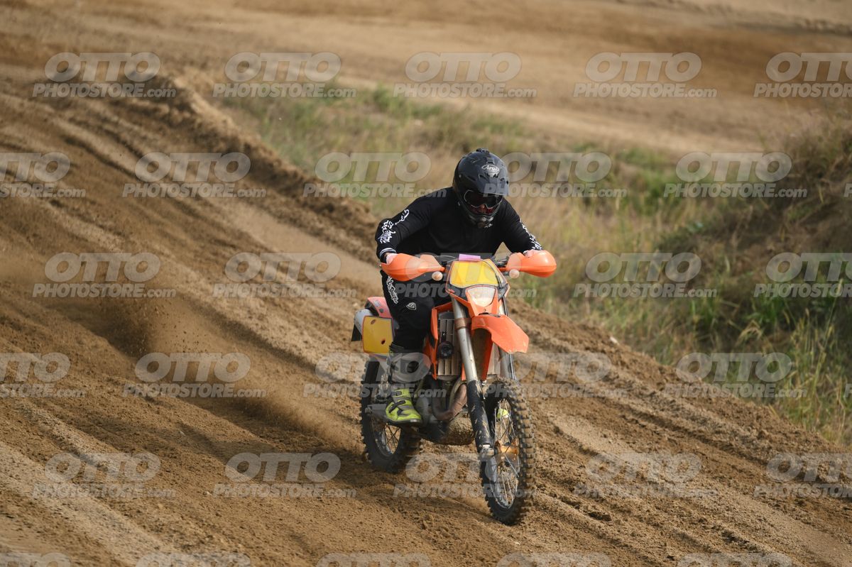 KTM EXC ORANGE - BLACK SUIT WITH WHITE GRAPHICS - BLACK HELMET WITH GOGGLES - FLUO YELLOW BOOTS · DSH_0227
