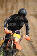 KTM EXC ORANGE - BLACK SUIT WITH WHITE GRAPHICS - BLACK HELMET WITH GOGGLES - FLUO YELLOW BOOTS · DSH_0402