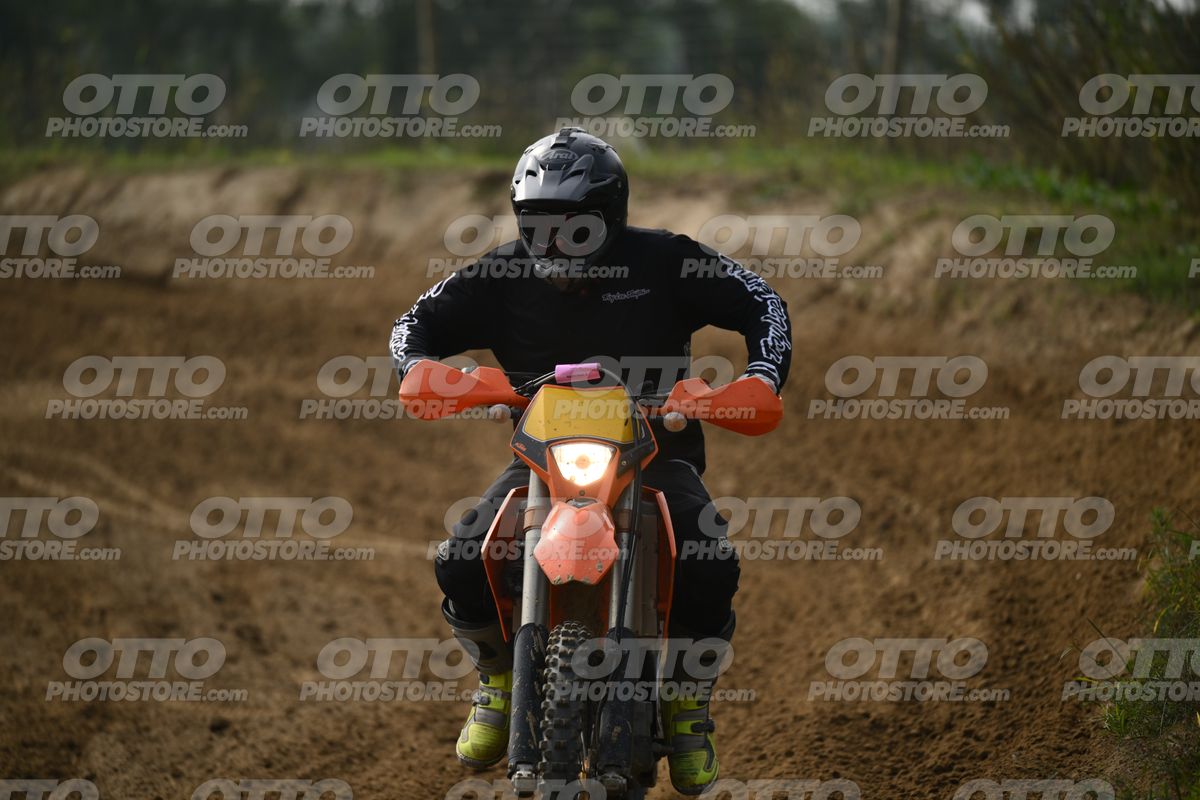 KTM EXC ORANGE - BLACK SUIT WITH WHITE GRAPHICS - BLACK HELMET WITH GOGGLES - FLUO YELLOW BOOTS · DSH_0491