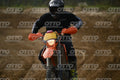 KTM EXC ORANGE - BLACK SUIT WITH WHITE GRAPHICS - BLACK HELMET WITH GOGGLES - FLUO YELLOW BOOTS · DSH_0493