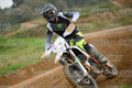 WHITE BIKE WITH PINK NUMBER PLATE - BLACK GREY FLUO GREEN FOX SUIT WITH FLUO YELLOW GREEN TEAL PANTS - BLACK GREY HELMET · DSH_0547