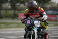PITBIKE - SCOOTER WHITE BLACK MINI SPORT BIKE WITH TEAL TRIM AND PINK PLATE - ORANGE BLACK FLUO YELLOW MTECH SUIT - BLACK HELMET WITH ORANGE VISOR · DSH_0681