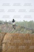 WHITE BIKE WITH PINK NUMBER PLATE - BLACK GREY FLUO GREEN FOX SUIT WITH FLUO YELLOW GREEN TEAL PANTS - BLACK GREY HELMET · DSH_0682