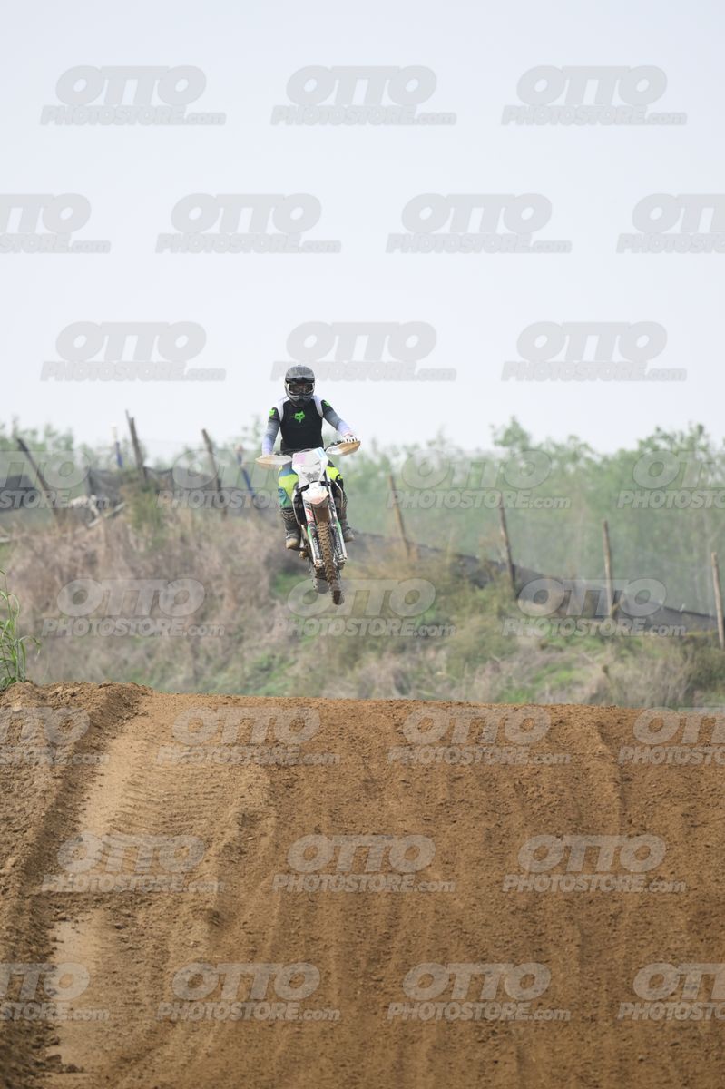 WHITE BIKE WITH PINK NUMBER PLATE - BLACK GREY FLUO GREEN FOX SUIT WITH FLUO YELLOW GREEN TEAL PANTS - BLACK GREY HELMET · DSH_0683