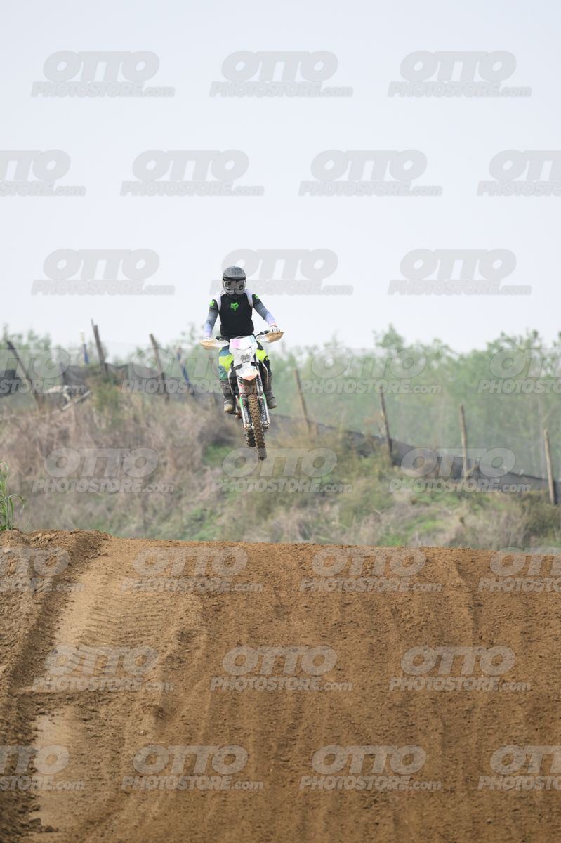 WHITE BIKE WITH PINK NUMBER PLATE - BLACK GREY FLUO GREEN FOX SUIT WITH FLUO YELLOW GREEN TEAL PANTS - BLACK GREY HELMET · DSH_0684
