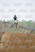 WHITE BIKE WITH PINK NUMBER PLATE - BLACK GREY FLUO GREEN FOX SUIT WITH FLUO YELLOW GREEN TEAL PANTS - BLACK GREY HELMET · DSH_0686