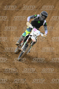 WHITE BIKE WITH PINK NUMBER PLATE - BLACK GREY FLUO GREEN FOX SUIT WITH FLUO YELLOW GREEN TEAL PANTS - BLACK GREY HELMET · DSH_0691