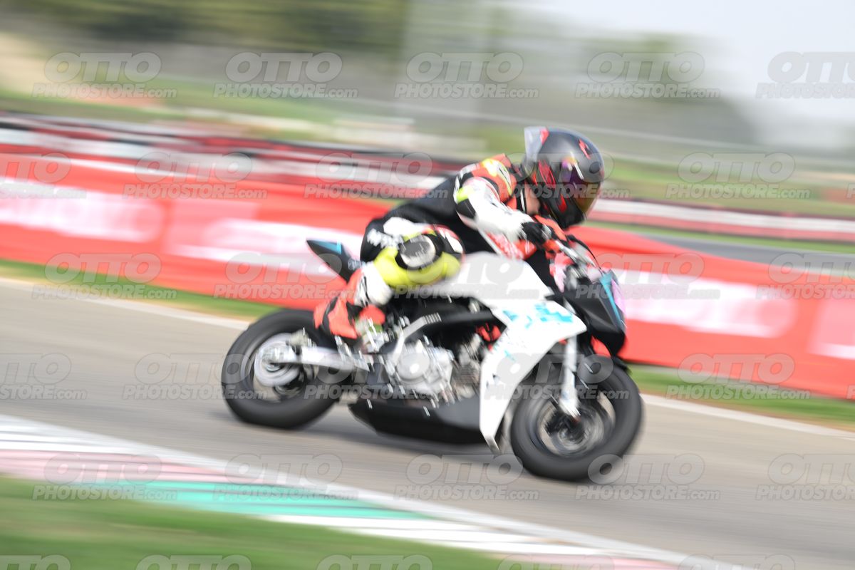 PITBIKE - SCOOTER WHITE BLACK MINI SPORT BIKE WITH TEAL TRIM AND PINK PLATE - ORANGE BLACK FLUO YELLOW MTECH SUIT - BLACK HELMET WITH ORANGE VISOR · DSH_0886