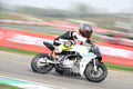 PITBIKE - SCOOTER WHITE BLACK MINI SPORT BIKE WITH TEAL TRIM AND PINK PLATE - ORANGE BLACK FLUO YELLOW MTECH SUIT - BLACK HELMET WITH ORANGE VISOR · DSH_0888