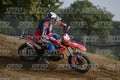 BETA RR RED WHITE BLUE - RED BLACK FXR SUIT WITH BLUE PANTS - WHITE RED HELMET WITH GREEN GOGGLES · DSH_1596