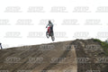 HONDA CRF RED - WHITE BLACK SUIT WITH BLACK PANTS - BLACK WHITE GREEN HELMET WITH MONSTER GRAPHICS · DSH_1615