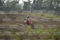 HONDA CRF RED - WHITE BLACK SUIT WITH BLACK PANTS - BLACK WHITE GREEN HELMET WITH MONSTER GRAPHICS · DSH_1695