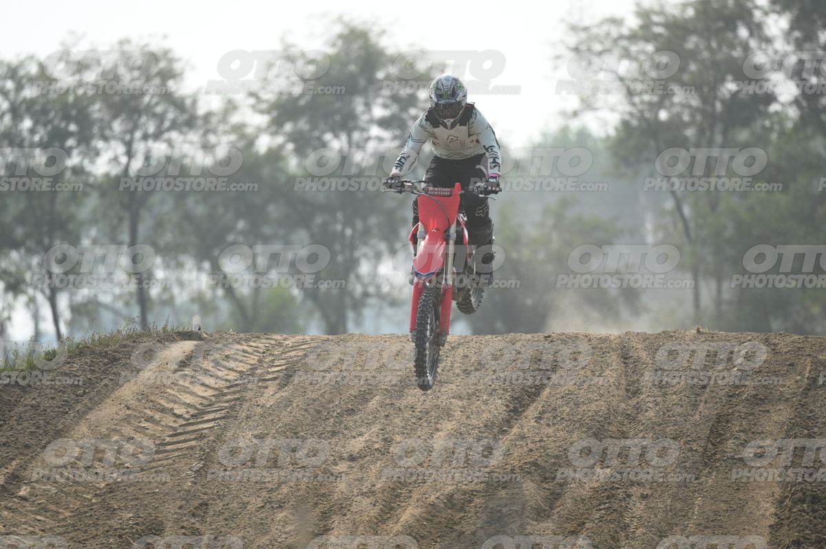 HONDA CRF RED - WHITE BLACK SUIT WITH BLACK PANTS - BLACK WHITE GREEN HELMET WITH MONSTER GRAPHICS · DSH_1795