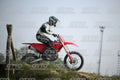 HONDA CRF RED - WHITE BLACK SUIT WITH BLACK PANTS - BLACK WHITE GREEN HELMET WITH MONSTER GRAPHICS · DSH_1821