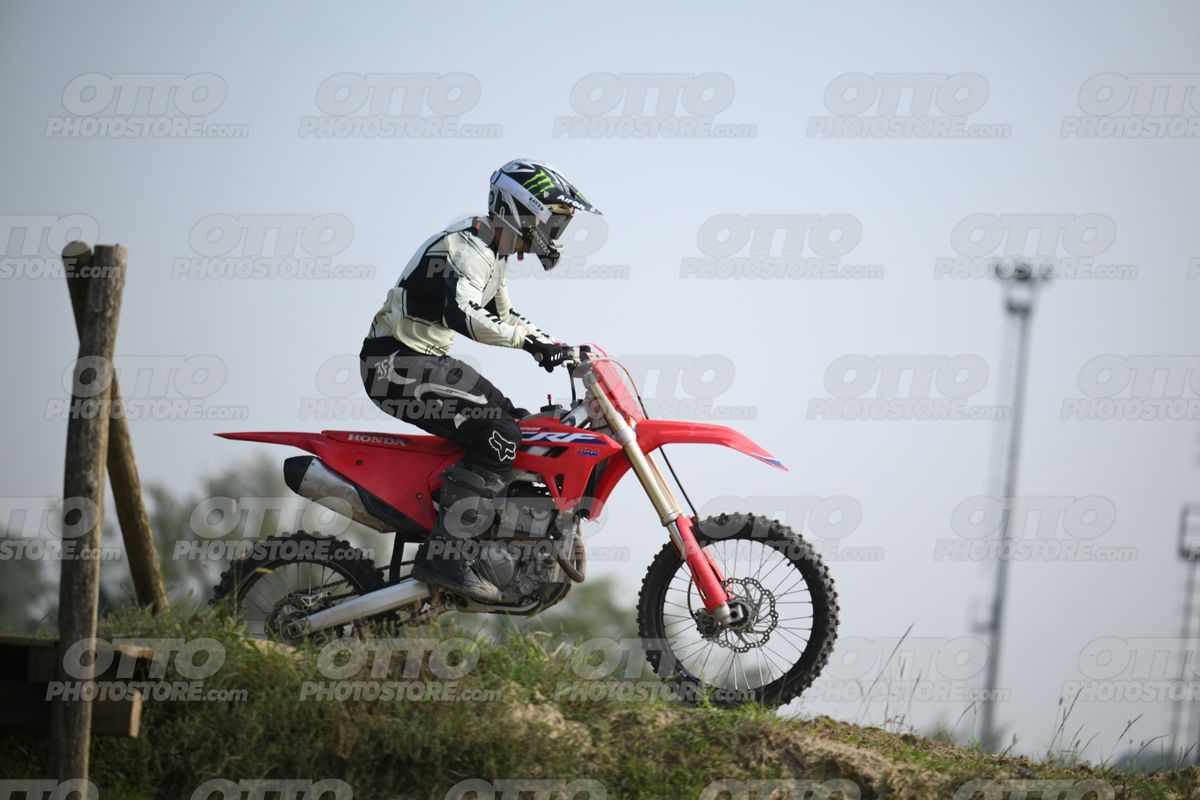 HONDA CRF RED - WHITE BLACK SUIT WITH BLACK PANTS - BLACK WHITE GREEN HELMET WITH MONSTER GRAPHICS · DSH_1821