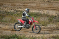 HONDA CRF RED - WHITE BLACK SUIT WITH BLACK PANTS - BLACK WHITE GREEN HELMET WITH MONSTER GRAPHICS · DSH_1887