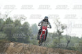 HONDA CRF RED - WHITE BLACK SUIT WITH BLACK PANTS - BLACK WHITE GREEN HELMET WITH MONSTER GRAPHICS · DSH_1896