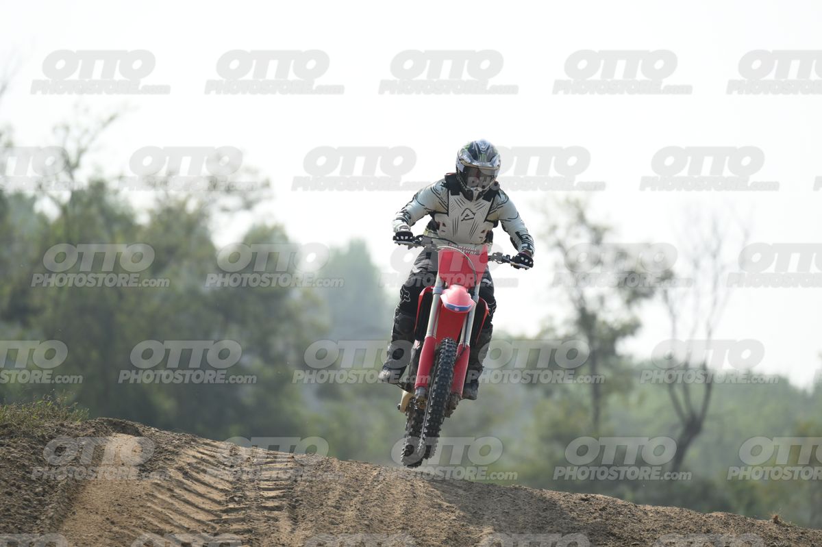 HONDA CRF RED - WHITE BLACK SUIT WITH BLACK PANTS - BLACK WHITE GREEN HELMET WITH MONSTER GRAPHICS · DSH_1897