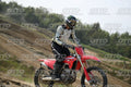 HONDA CRF RED - WHITE BLACK SUIT WITH BLACK PANTS - BLACK WHITE GREEN HELMET WITH MONSTER GRAPHICS · DSH_1911