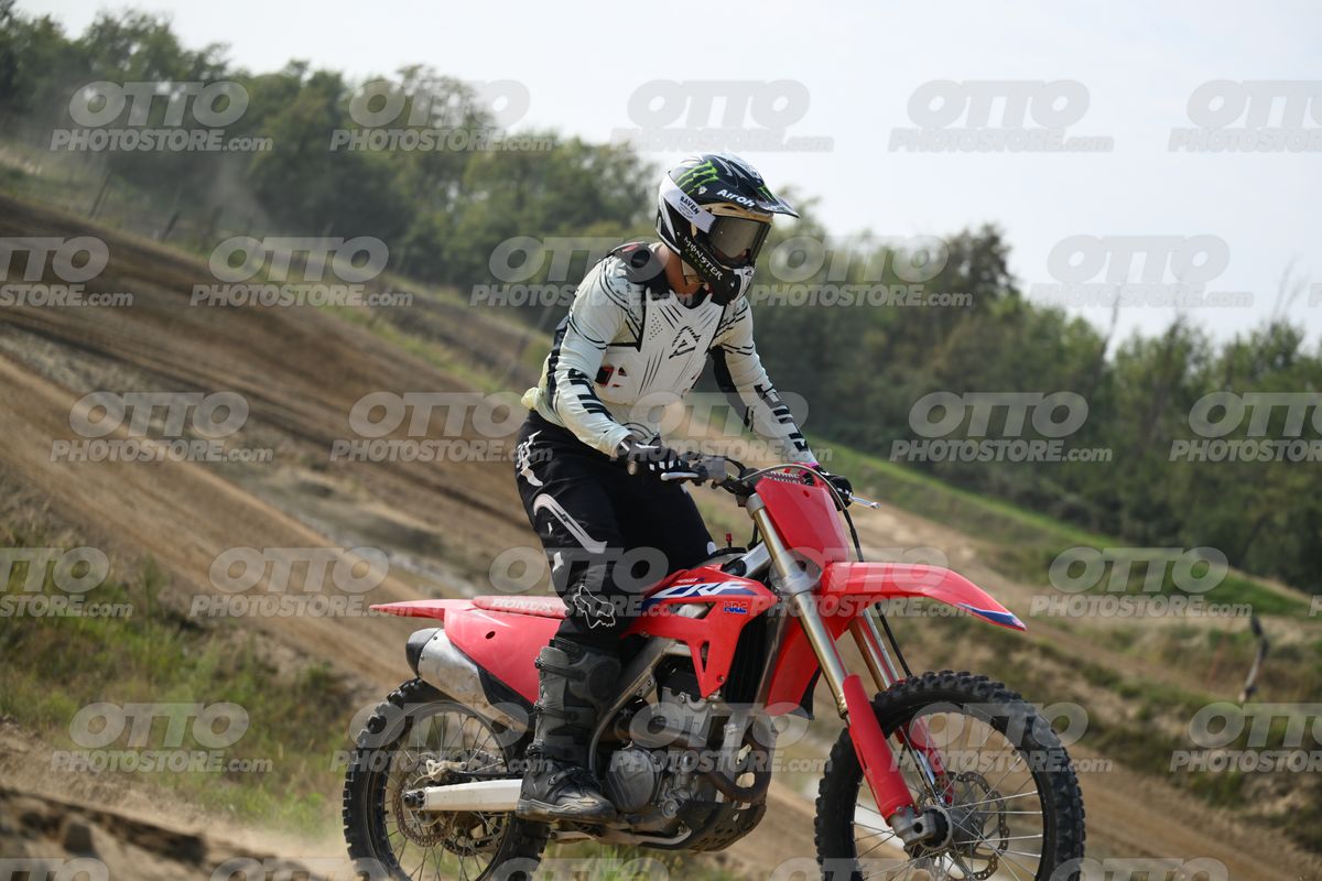HONDA CRF RED - WHITE BLACK SUIT WITH BLACK PANTS - BLACK WHITE GREEN HELMET WITH MONSTER GRAPHICS · DSH_1911