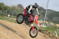 HONDA CRF RED - WHITE BLACK SUIT WITH BLACK PANTS - BLACK WHITE GREEN HELMET WITH MONSTER GRAPHICS · DSH_1926