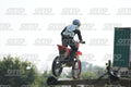 HONDA CRF RED - WHITE BLACK SUIT WITH BLACK PANTS - BLACK WHITE GREEN HELMET WITH MONSTER GRAPHICS · DSH_1931