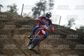 BETA RR RED WHITE BLUE - RED BLACK FXR SUIT WITH BLUE PANTS - WHITE RED HELMET WITH GREEN GOGGLES · DSH_2023