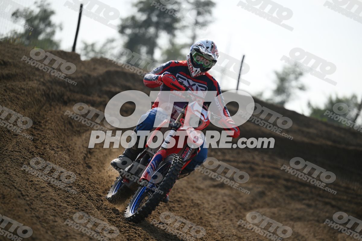 BETA RR RED WHITE BLUE - RED BLACK FXR SUIT WITH BLUE PANTS - WHITE RED HELMET WITH GREEN GOGGLES · DSH_2024
