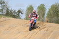 BETA RR RED WHITE BLUE - RED BLACK FXR SUIT WITH BLUE PANTS - WHITE RED HELMET WITH GREEN GOGGLES · DSH_2109