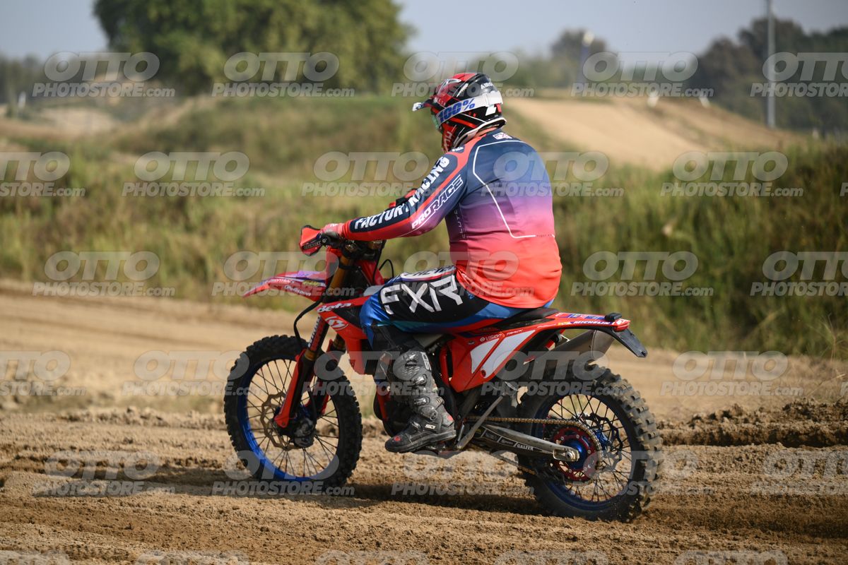 BETA RR RED WHITE BLUE - RED BLACK FXR SUIT WITH BLUE PANTS - WHITE RED HELMET WITH GREEN GOGGLES · DSH_2112