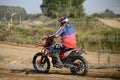 BETA RR RED WHITE BLUE - RED BLACK FXR SUIT WITH BLUE PANTS - WHITE RED HELMET WITH GREEN GOGGLES · DSH_2113