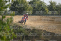 BETA RR RED WHITE BLUE - RED BLACK FXR SUIT WITH BLUE PANTS - WHITE RED HELMET WITH GREEN GOGGLES · DSH_2235