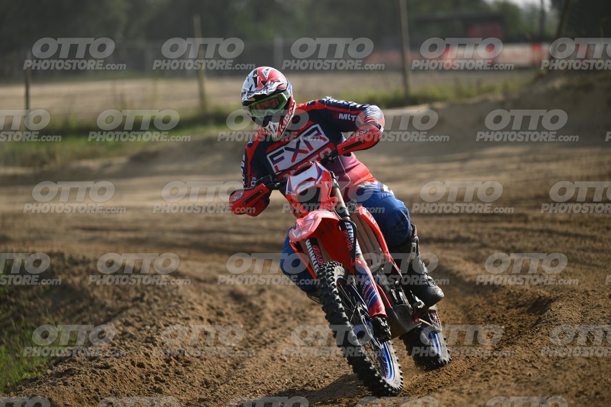 BETA RR RED WHITE BLUE - RED BLACK FXR SUIT WITH BLUE PANTS - WHITE RED HELMET WITH GREEN GOGGLES · DSH_2399
