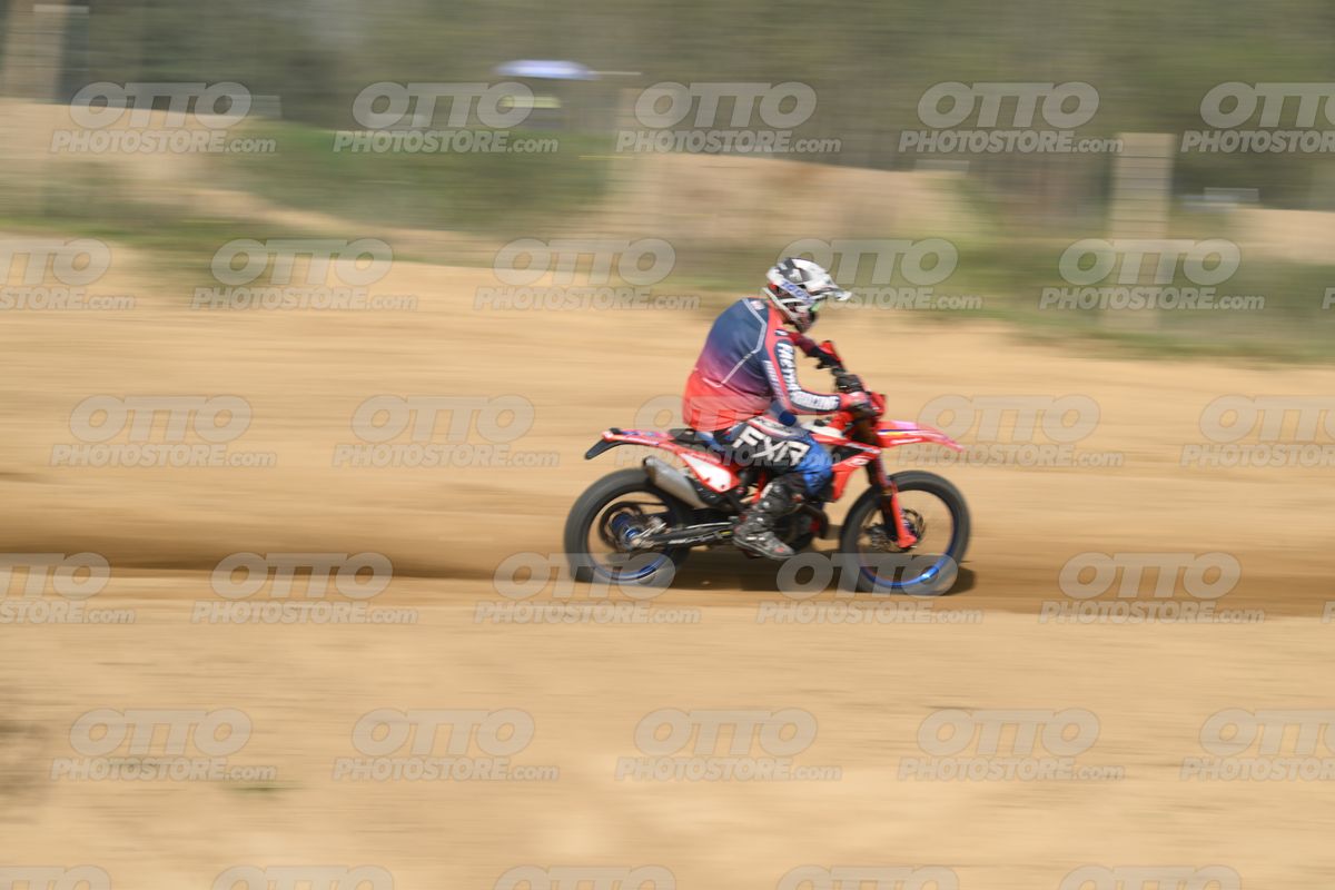 BETA RR RED WHITE BLUE - RED BLACK FXR SUIT WITH BLUE PANTS - WHITE RED HELMET WITH GREEN GOGGLES · DSH_3006
