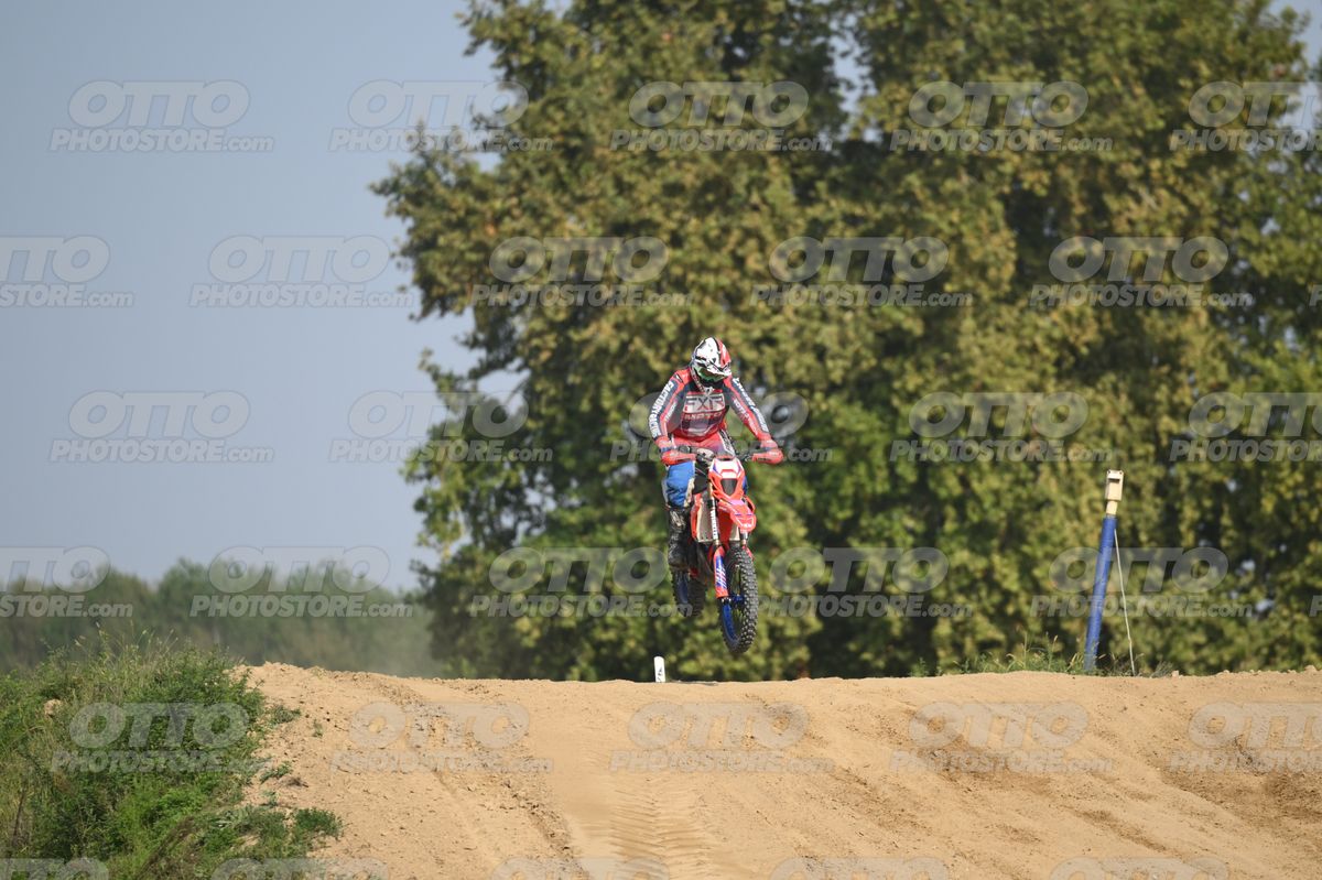 BETA RR RED WHITE BLUE - RED BLACK FXR SUIT WITH BLUE PANTS - WHITE RED HELMET WITH GREEN GOGGLES · DSH_3143