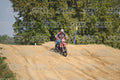 BETA RR RED WHITE BLUE - RED BLACK FXR SUIT WITH BLUE PANTS - WHITE RED HELMET WITH GREEN GOGGLES · DSH_3144