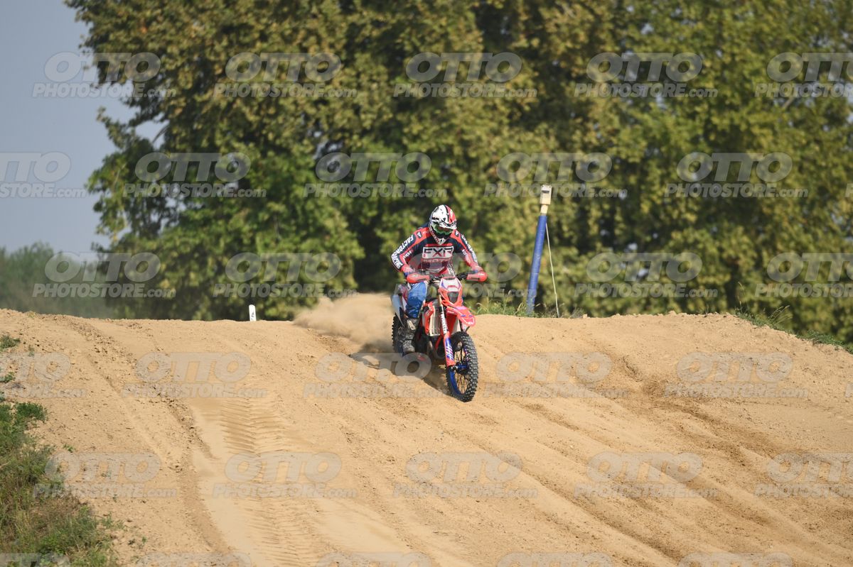 BETA RR RED WHITE BLUE - RED BLACK FXR SUIT WITH BLUE PANTS - WHITE RED HELMET WITH GREEN GOGGLES · DSH_3144