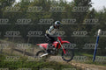 HONDA CRF RED - WHITE BLACK SUIT WITH BLACK PANTS - BLACK WHITE GREEN HELMET WITH MONSTER GRAPHICS · DSH_3200