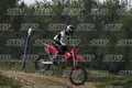 HONDA CRF RED - WHITE BLACK SUIT WITH BLACK PANTS - BLACK WHITE GREEN HELMET WITH MONSTER GRAPHICS · DSH_3204