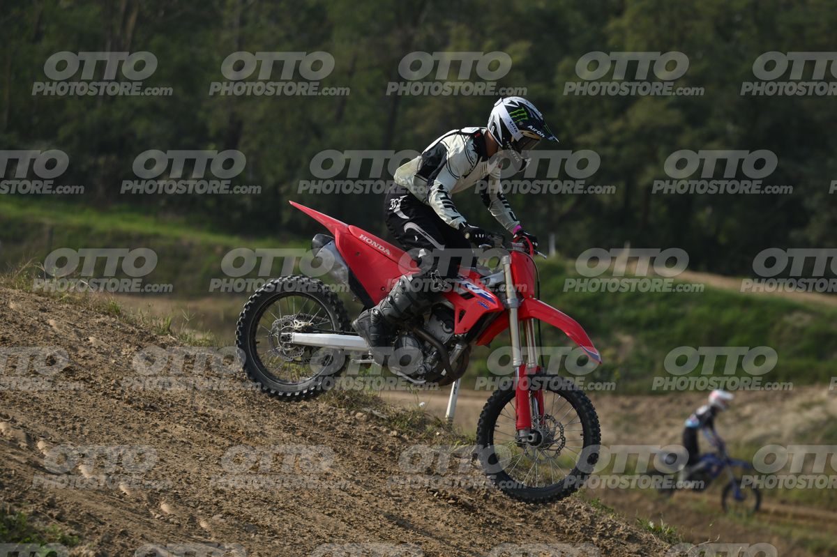 HONDA CRF RED - WHITE BLACK SUIT WITH BLACK PANTS - BLACK WHITE GREEN HELMET WITH MONSTER GRAPHICS · DSH_3207