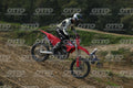 HONDA CRF RED - WHITE BLACK SUIT WITH BLACK PANTS - BLACK WHITE GREEN HELMET WITH MONSTER GRAPHICS · DSH_3208