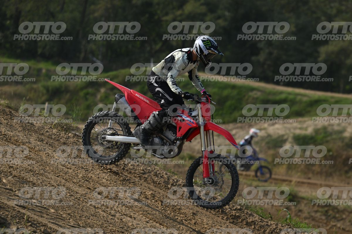 HONDA CRF RED - WHITE BLACK SUIT WITH BLACK PANTS - BLACK WHITE GREEN HELMET WITH MONSTER GRAPHICS · DSH_3208
