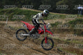 HONDA CRF RED - WHITE BLACK SUIT WITH BLACK PANTS - BLACK WHITE GREEN HELMET WITH MONSTER GRAPHICS · DSH_3209