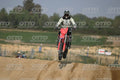 HONDA CRF RED - WHITE BLACK SUIT WITH BLACK PANTS - BLACK WHITE GREEN HELMET WITH MONSTER GRAPHICS · DSH_3216