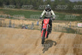 HONDA CRF RED - WHITE BLACK SUIT WITH BLACK PANTS - BLACK WHITE GREEN HELMET WITH MONSTER GRAPHICS · DSH_3218