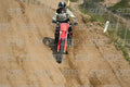 HONDA CRF RED - WHITE BLACK SUIT WITH BLACK PANTS - BLACK WHITE GREEN HELMET WITH MONSTER GRAPHICS · DSH_3295