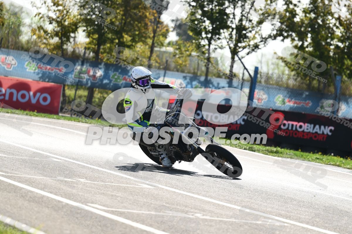 SUPERMOTO HUSQVARNA BLACK WHITE SUPERMOTO - WHITE BLUE FLUO YELLOW SUIT - WHITE HELMET · DSH_3660
