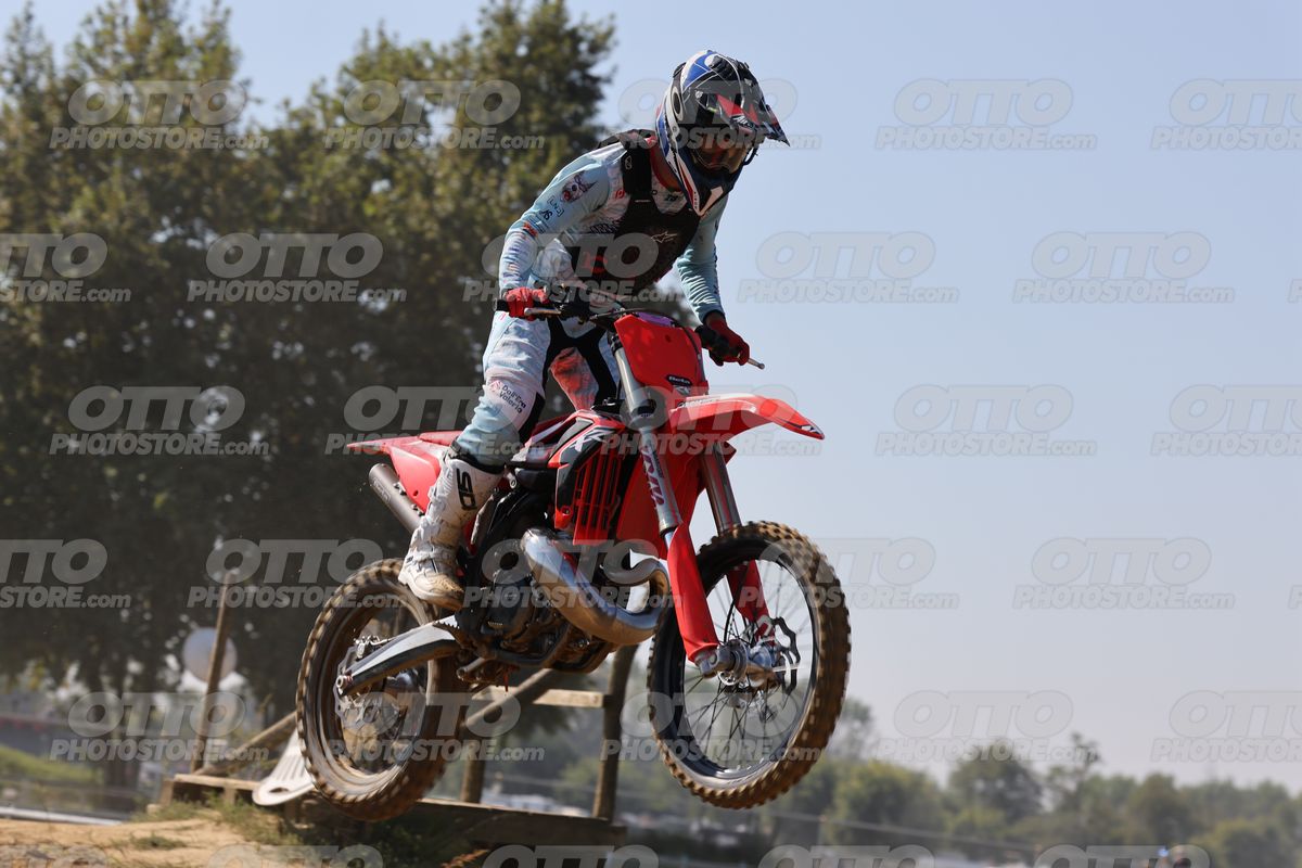 GAS GAS RED - LIGHT BLUE WHITE SUIT - BLACK BLUE RED HELMET · JD9A3989